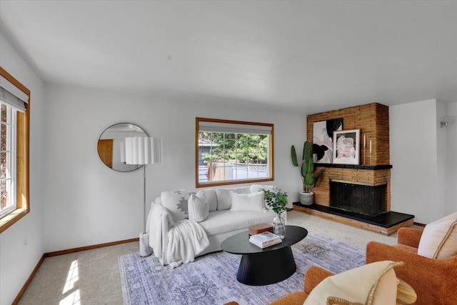 1010 W Westmont Way, Spokane, WA 99208 - carpeted living area featuring baseboards and a large fireplace