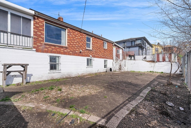 18 E Euclid Ave, Spokane, WA 99207 - view of side of home featuring a chimney and brick siding