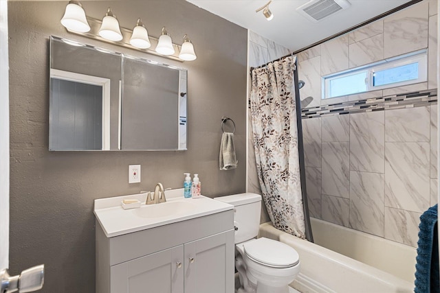 18 E Euclid Ave, Spokane, WA 99207 - bathroom featuring vanity, toilet, and shower / bathtub combination with curtain