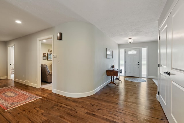 2203 W Strong Rd, Spokane, WA 99208 - entrance foyer featuring dark wood-style floors, baseboards, recessed lighting, and a textured ceiling