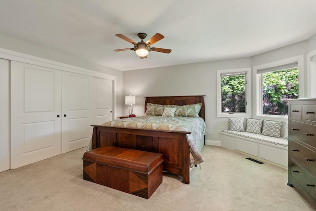 2203 W Strong Rd, Spokane, WA 99208 - bedroom featuring light colored carpet, a closet, and ceiling fan