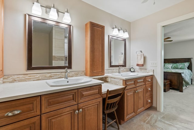2203 W Strong Rd, Spokane, WA 99208 - ensuite bathroom with vanity, tasteful backsplash, and a ceiling fan