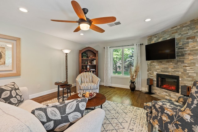 2203 W Strong Rd, Spokane, WA 99208 - living area featuring ceiling fan, baseboards, a stone fireplace, hardwood / wood-style floors, and recessed lighting