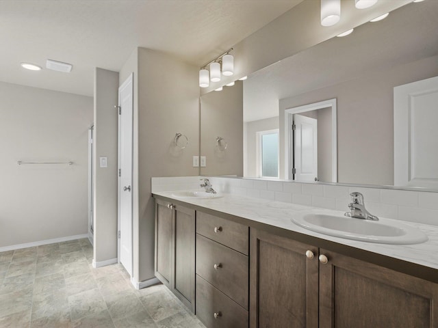 5112 N Silas Ln Unit 9/1Talent, Spokane Valley, WA 99216 - full bath with double vanity, baseboards, and an enclosed shower