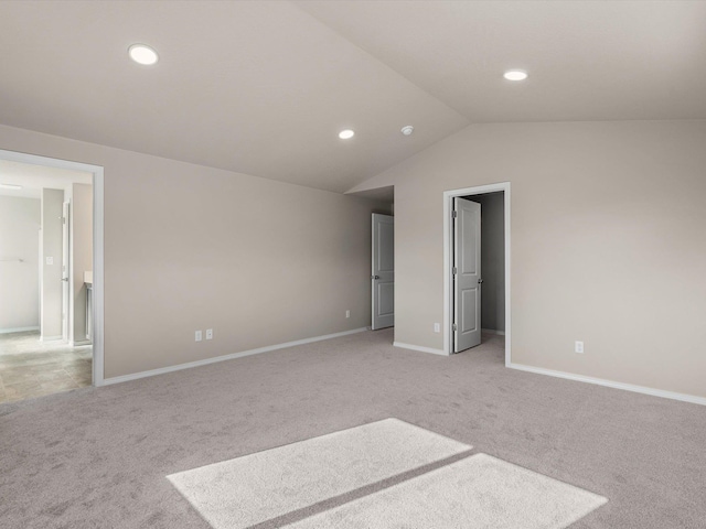 5112 N Silas Ln Unit 9/1Talent, Spokane Valley, WA 99216 - unfurnished bedroom with light carpet, vaulted ceiling, recessed lighting, baseboards, and a walk in closet