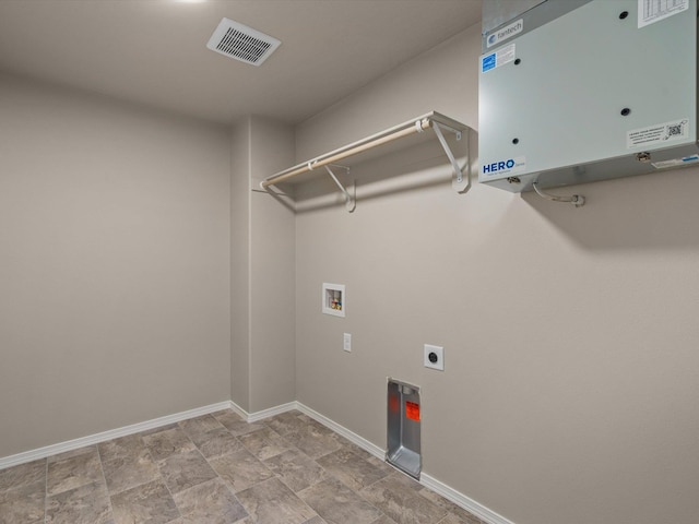 5112 N Silas Ln Unit 9/1Talent, Spokane Valley, WA 99216 - laundry area featuring hookup for an electric dryer, washer hookup, tankless water heater, and baseboards