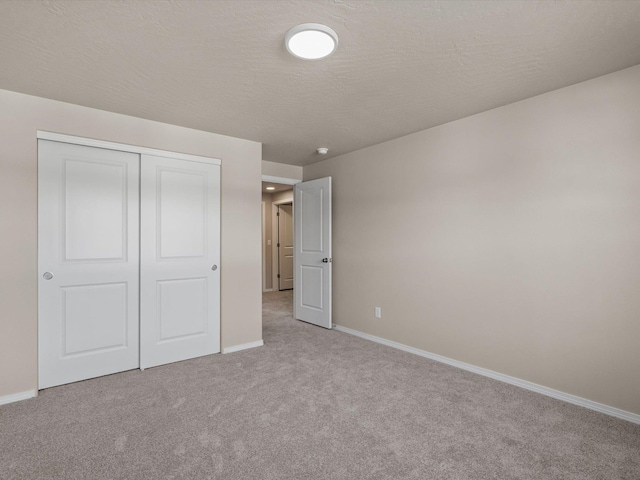 5112 N Silas Ln Unit 9/1Talent, Spokane Valley, WA 99216 - unfurnished bedroom with carpet flooring, baseboards, and a closet