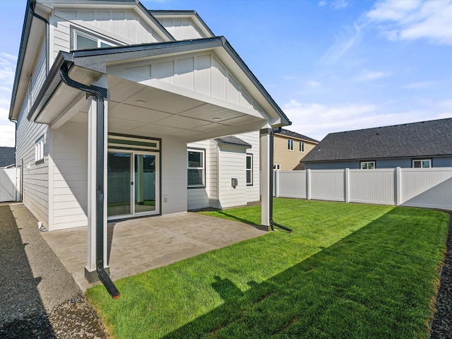 5112 N Silas Ln Unit 9/1Talent, Spokane Valley, WA 99216 - rear view of house featuring board and batten siding and a patio area