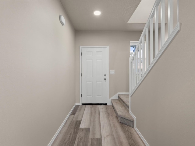 5112 N Silas Ln Unit 9/1Talent, Spokane Valley, WA 99216 - entryway with baseboards, wood finished floors, stairway, and recessed lighting