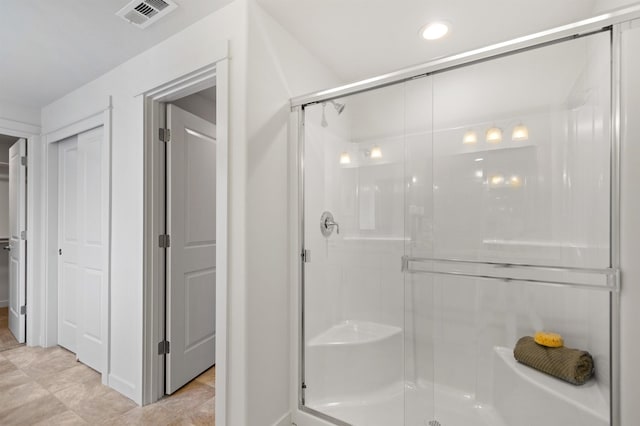 1624 W 68th Ave Unit 2/2Timberline, Spokane, WA 99224 - full bath with a stall shower, baseboards, a closet, and tile patterned flooring