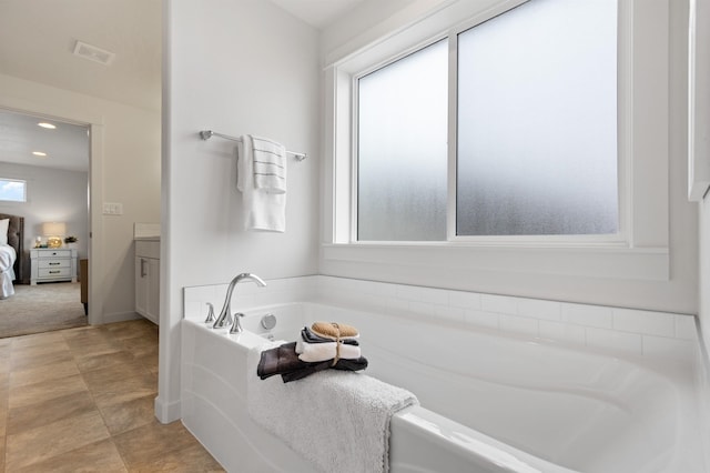 1624 W 68th Ave Unit 2/2Timberline, Spokane, WA 99224 - full bath featuring a bath, ensuite bath, vanity, and recessed lighting