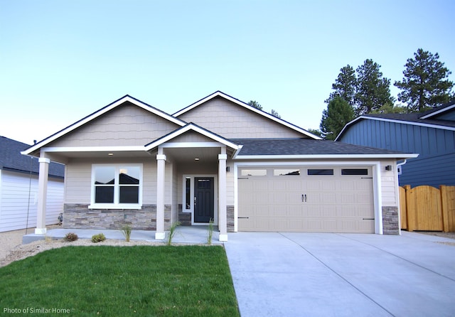 1438 W 67th Ave Lot 5Block 3, Orchard, Spokane, WA 99224 - view of front facade with stone siding, an attached garage, and driveway