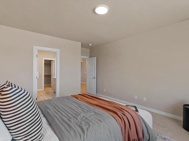1438 W 67th Ave Lot 5Block 3, Orchard, Spokane, WA 99224 - bedroom featuring baseboards and a spacious closet