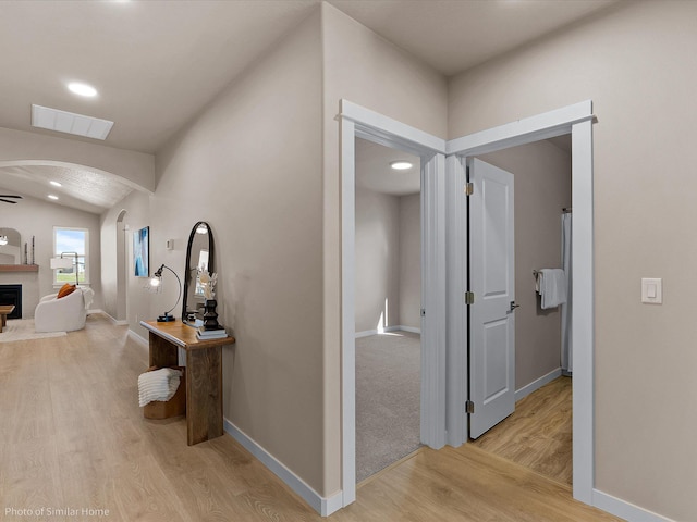 1438 W 67th Ave Lot 5Block 3, Orchard, Spokane, WA 99224 - hallway featuring arched walkways, light wood finished floors, baseboards, recessed lighting, and lofted ceiling