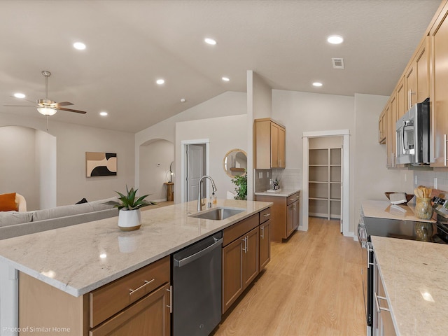 1438 W 67th Ave Lot 5Block 3, Orchard, Spokane, WA 99224 - kitchen featuring a sink, appliances with stainless steel finishes, arched walkways, open floor plan, and a ceiling fan