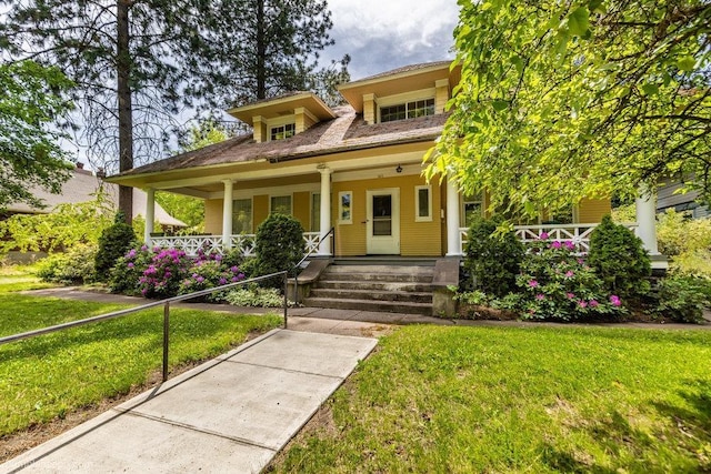 1611 W 9th Ave, Spokane, WA 99223 - view of front of house featuring covered porch and a front lawn