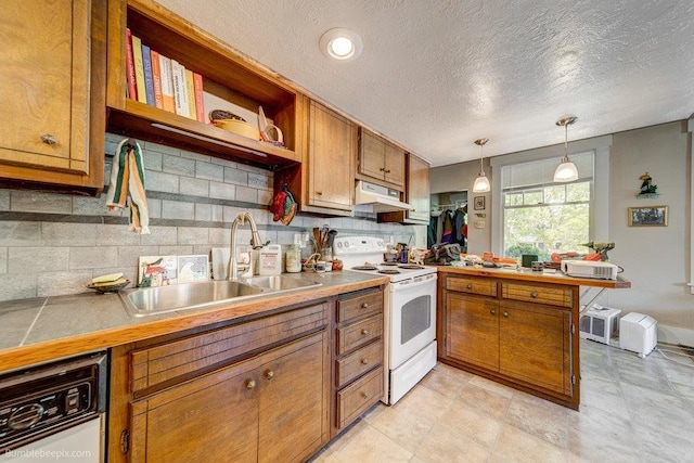 1611 W 9th Ave, Spokane, WA 99223 - kitchen featuring white appliances, a peninsula, brown cabinets, a sink, and backsplash