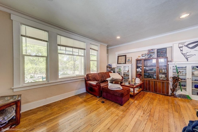 1611 W 9th Ave, Spokane, WA 99223 - sitting room with crown molding, light wood-style flooring, baseboards, and recessed lighting