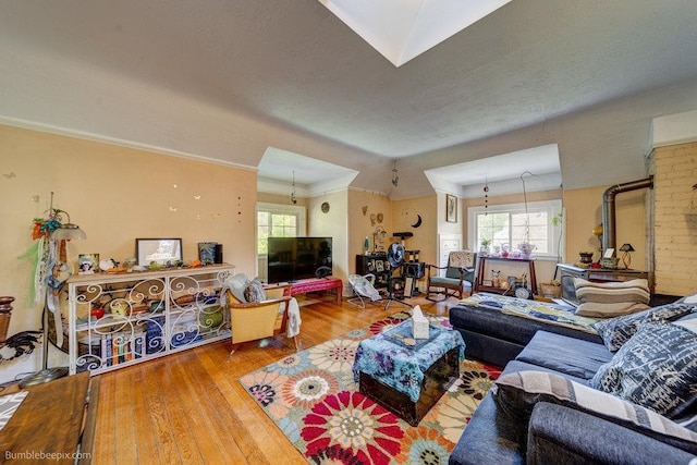 1611 W 9th Ave, Spokane, WA 99223 - living area featuring wood-type flooring and a raised ceiling