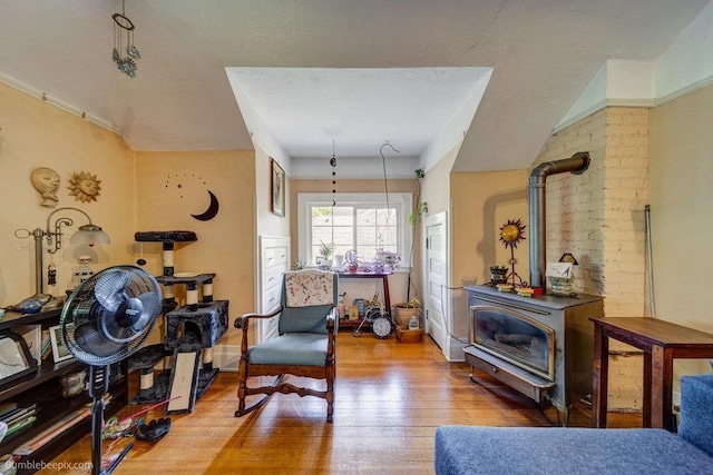 1611 W 9th Ave, Spokane, WA 99223 - sitting room featuring a wood stove and wood-type flooring