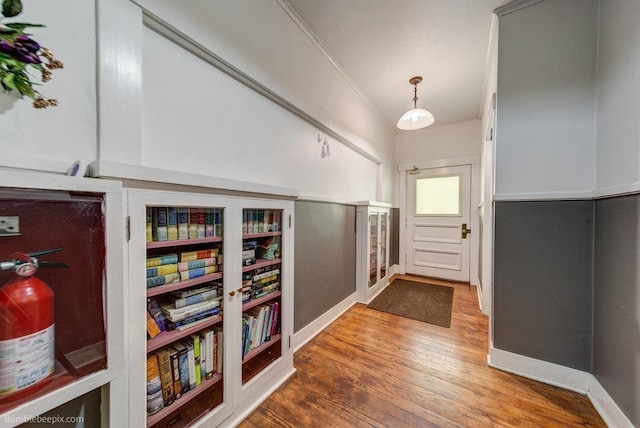 1611 W 9th Ave, Spokane, WA 99223 - hallway with wood finished floors, baseboards, and crown molding
