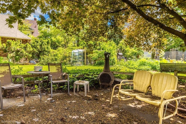 1611 W 9th Ave, Spokane, WA 99223 - view of yard with an outdoor structure and an exterior structure