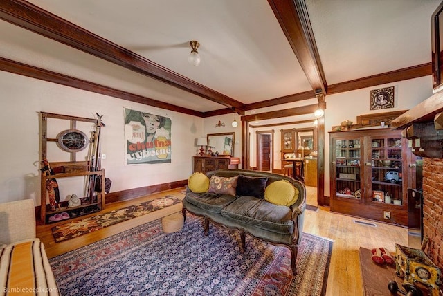 1621 W 9th Ave, Spokane, WA 99223 - living area with crown molding, beam ceiling, and wood finished floors