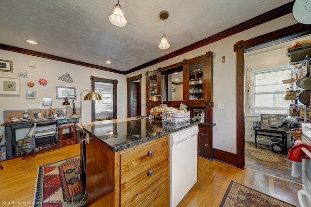 1621 W 9th Ave, Spokane, WA 99223 - kitchen featuring white dishwasher, crown molding, light wood-type flooring, a textured ceiling, and baseboards
