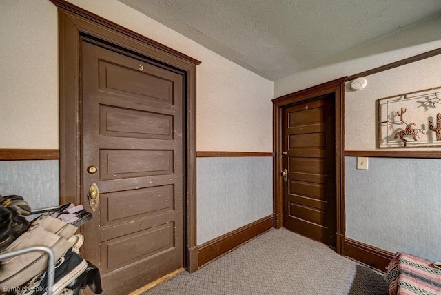 1621 W 9th Ave, Spokane, WA 99223 - carpeted bedroom with a textured ceiling, vaulted ceiling, and baseboards