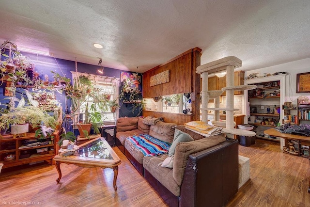 1621 W 9th Ave, Spokane, WA 99223 - living area featuring a textured ceiling and wood finished floors