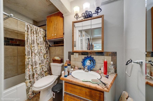 1621 W 9th Ave, Spokane, WA 99223 - full bathroom with vanity, toilet, decorative backsplash, shower / bath combo, and tile walls