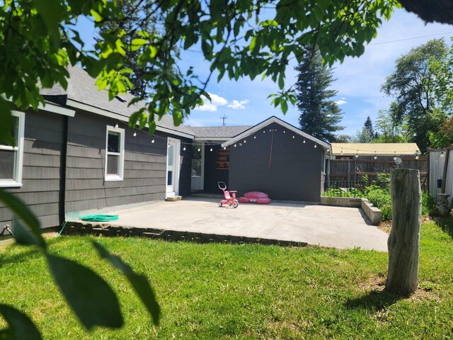 424 W Larch St, Newport, WA 99156 - rear view of house with a patio