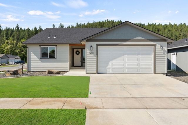 14101 E Sanson Ave, Spokane Valley, WA 99216 - ranch-style home featuring driveway, a front yard, and a garage