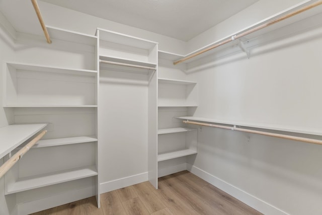 14101 E Sanson Ave, Spokane Valley, WA 99216 - walk in closet with wood finished floors