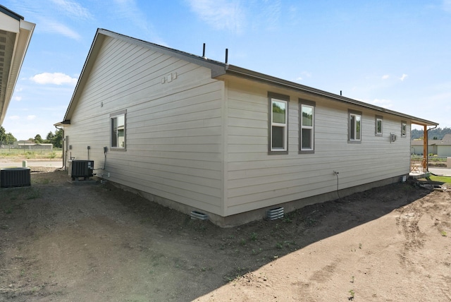 14101 E Sanson Ave, Spokane Valley, WA 99216 - view of home's exterior with central air condition unit and crawl space