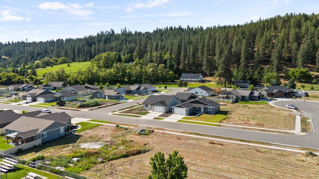 14101 E Sanson Ave, Spokane Valley, WA 99216 - aerial perspective of suburban area with a heavily wooded area