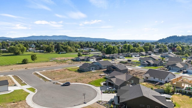 14101 E Sanson Ave, Spokane Valley, WA 99216 - aerial perspective of suburban area featuring a mountain backdrop