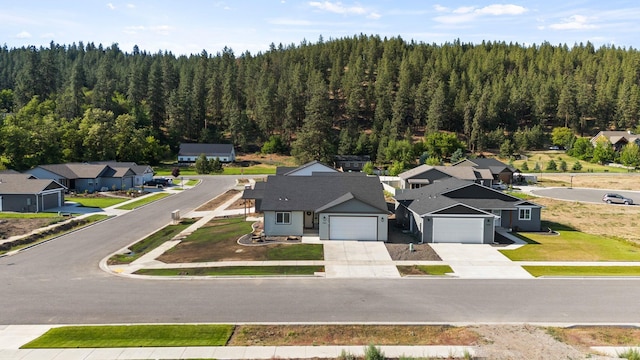 14101 E Sanson Ave, Spokane Valley, WA 99216 - aerial perspective of suburban area with a forest