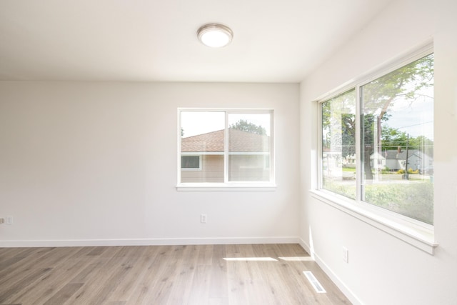 624 N Herald Rd Unit 2, Spokane Valley, WA 99206 - spare room featuring light wood finished floors and healthy amount of natural light