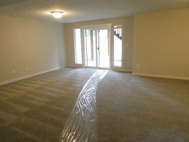 3223 S Custer Ln, Spokane, WA 99223 - unfurnished room with carpet floors and baseboards