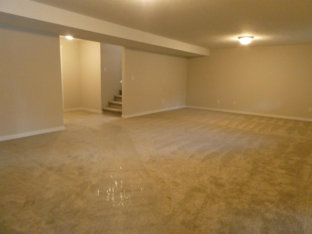 3223 S Custer Ln, Spokane, WA 99223 - finished below grade area with stairway, light carpet, and baseboards