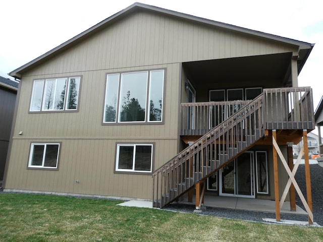 3223 S Custer Ln, Spokane, WA 99223 - back of property with stairs, a yard, a patio area, and a deck