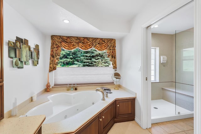 128C Buena Vista Rd, Colville, WA 99114 - full bath featuring a whirlpool tub, tile patterned floors, a walk in shower, and recessed lighting