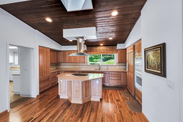 128C Buena Vista Rd, Colville, WA 99114 - kitchen featuring island range hood, wooden ceiling, light countertops, a kitchen island, and lofted ceiling