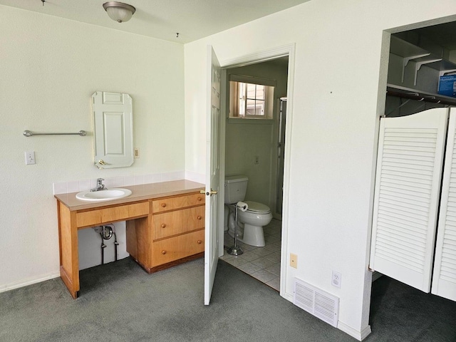 444 S Walnut St, Colville, WA 99114 - full bathroom featuring toilet, vanity, and carpet floors