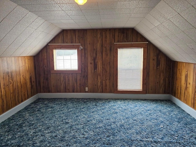 444 S Walnut St, Colville, WA 99114 - bonus room featuring vaulted ceiling, carpet flooring, wooden walls, and baseboards