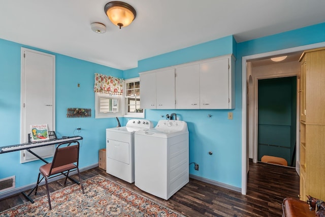 2503 W Upton Ave, Spokane, WA 99205 - washroom featuring cabinet space, washer and clothes dryer, dark wood-style floors, and baseboards