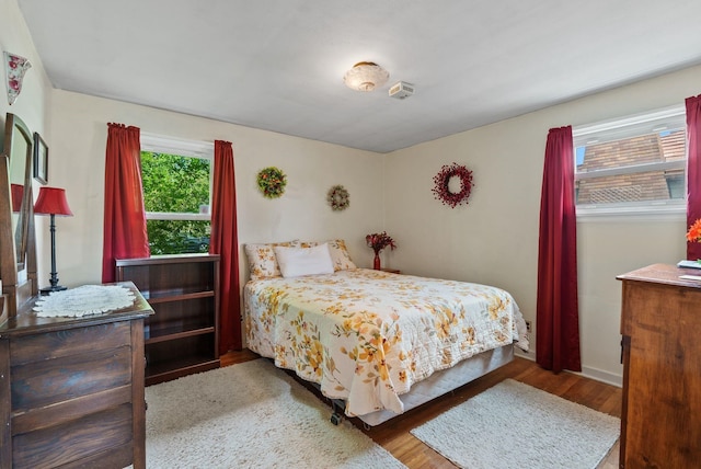 2503 W Upton Ave, Spokane, WA 99205 - bedroom featuring wood finished floors and baseboards