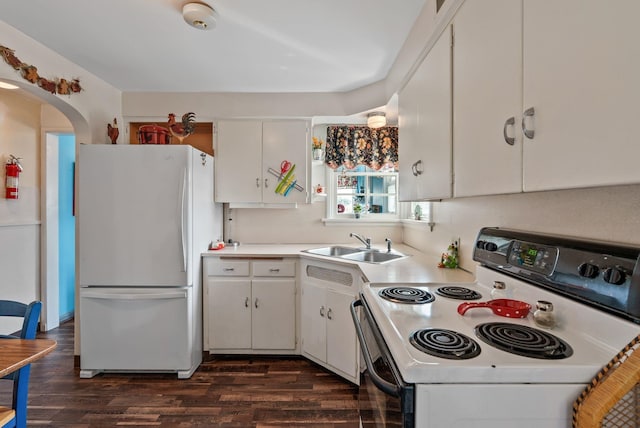 2503 W Upton Ave, Spokane, WA 99205 - kitchen featuring white appliances, a sink, dark wood-style floors, and light countertops