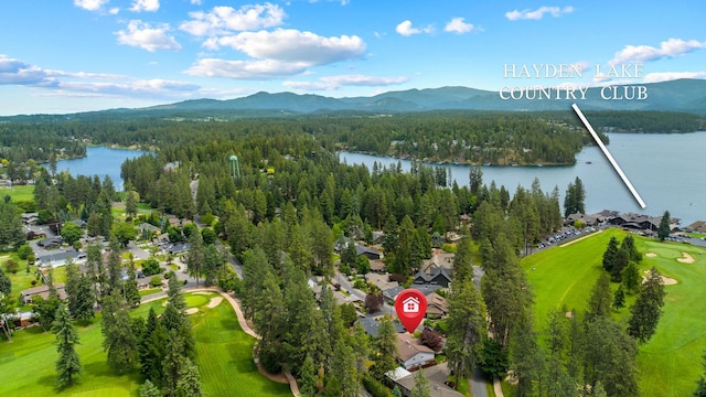 10101 N Pines Rd, Hayden, ID 83835 - bird's eye view of a heavily wooded area, a water and mountain view, and a golf course